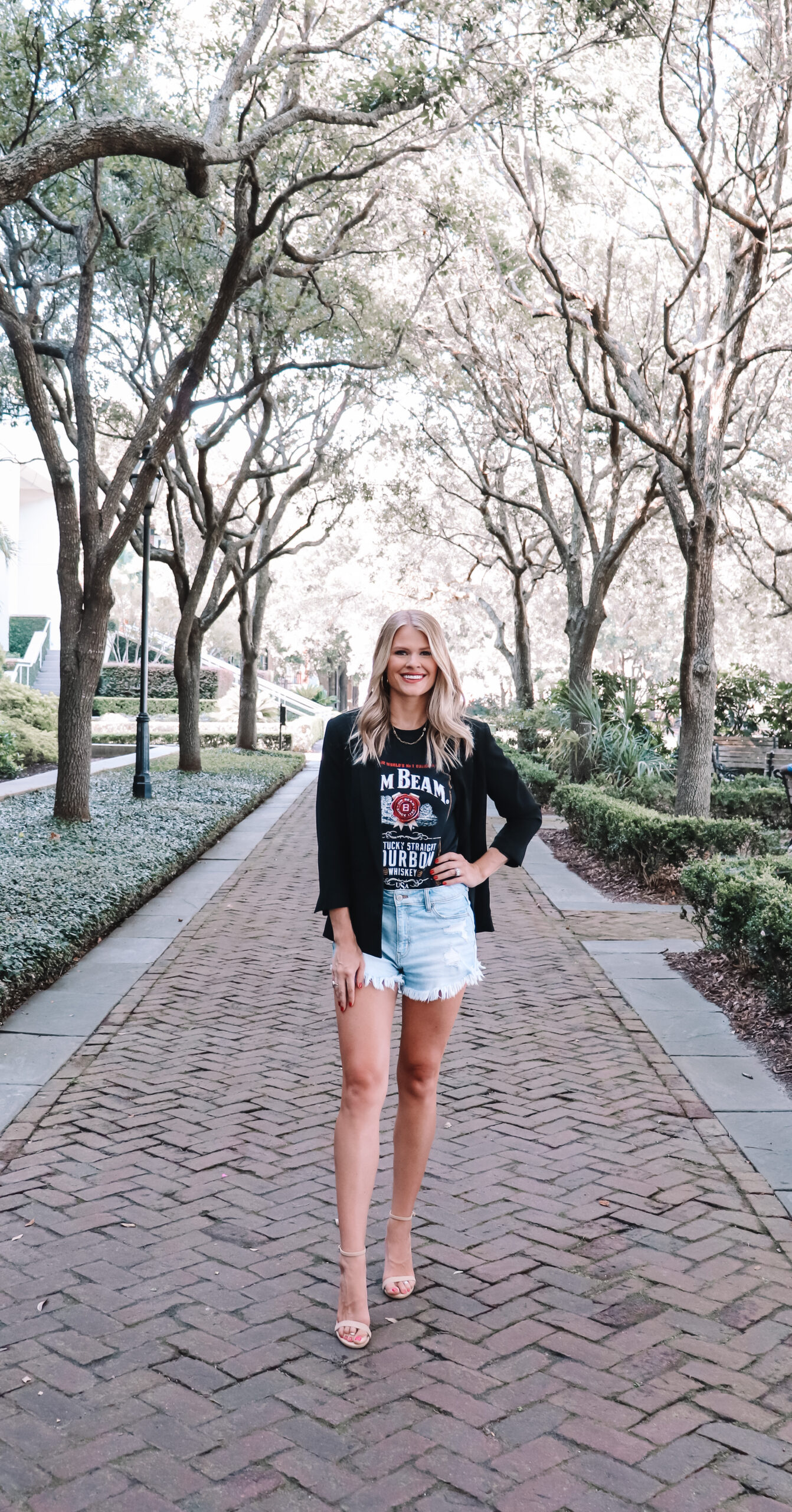 This image showcases one of my favorite purchases of 2020, the Nasty Gal Jim Beam graphic tee.